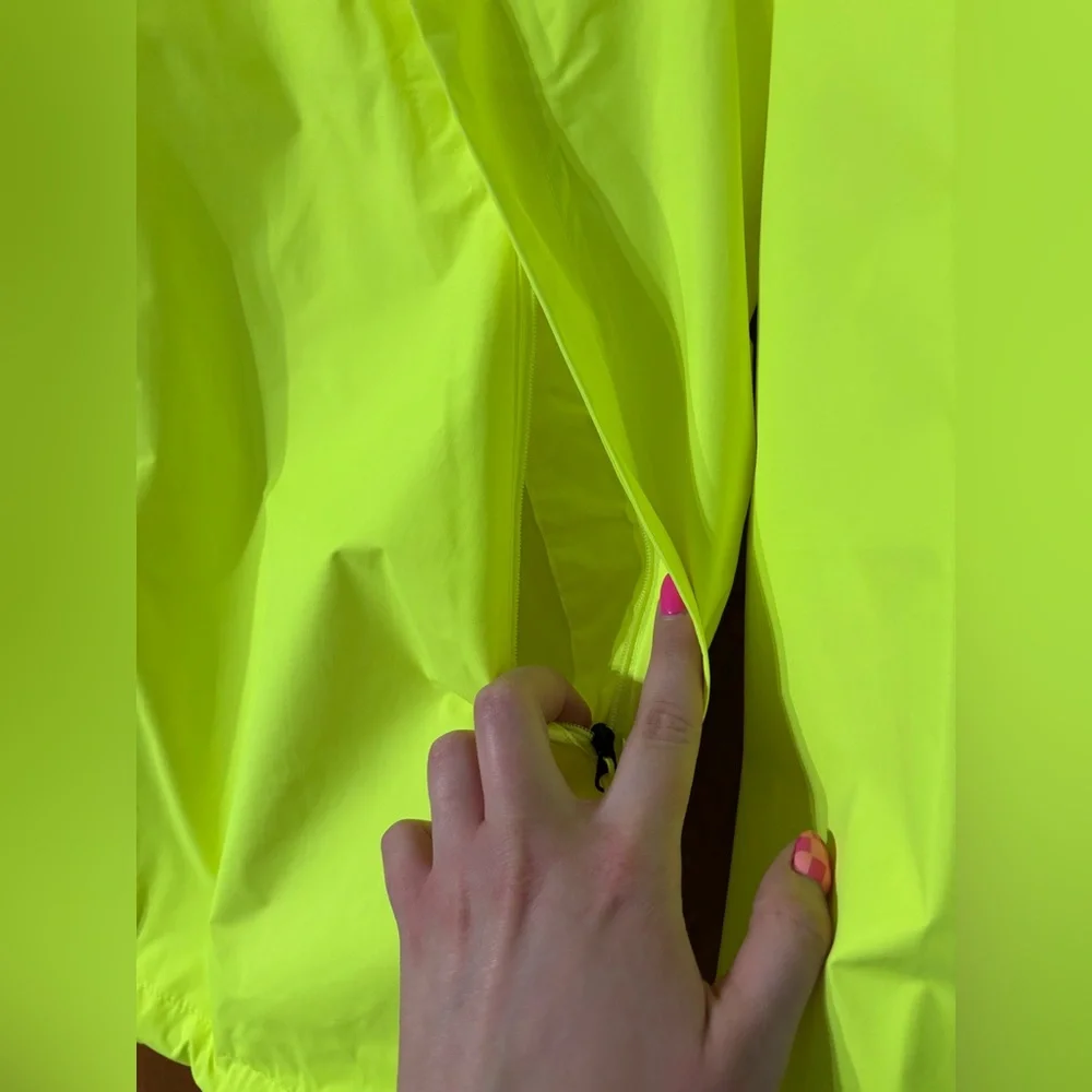 The North Face Neon Yellow and Black Windbreaker Coat